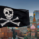 A photo of Moscow and its various buildings, with a black pirate flag waving in front of the city.